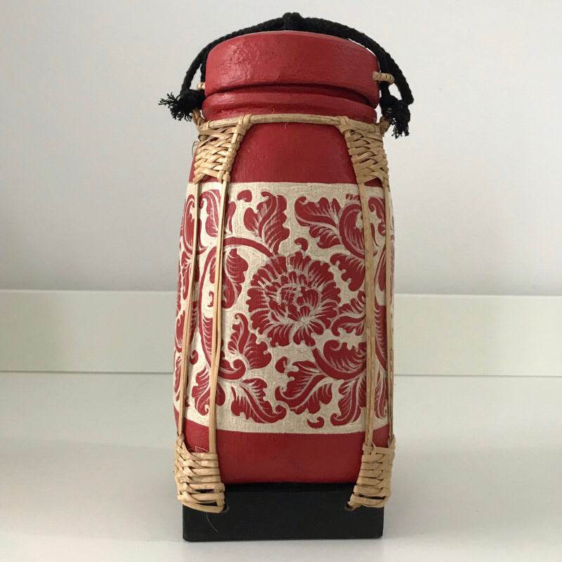 Handmade lanna bamboo rice box with red floral design and woven bamboo details by One-Sake.com