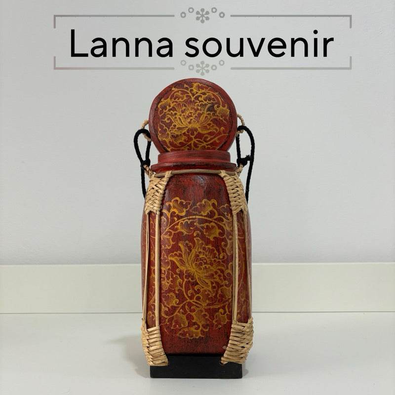 Handmade lanna bamboo rice box with intricate floral design and woven bamboo accents from One-Sake.com
