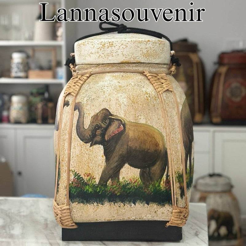 Handmade Thai decorative tray featuring elephant artwork with natural woven accents