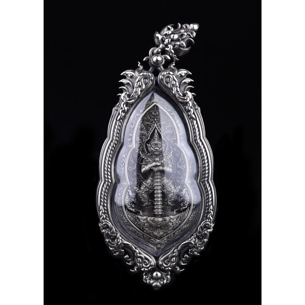 Vesuwanno amulet for wealth and protection in an ornate silver casing designed for spiritual and Feng Shui use