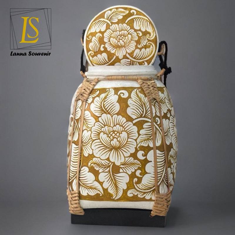 Lanna style bamboo storage box with traditional floral design and woven accents for home kitchen use