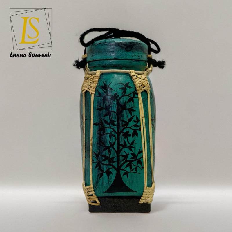 Handmade lanna bamboo rice box with tree design and carrying rope from One-Sake.com