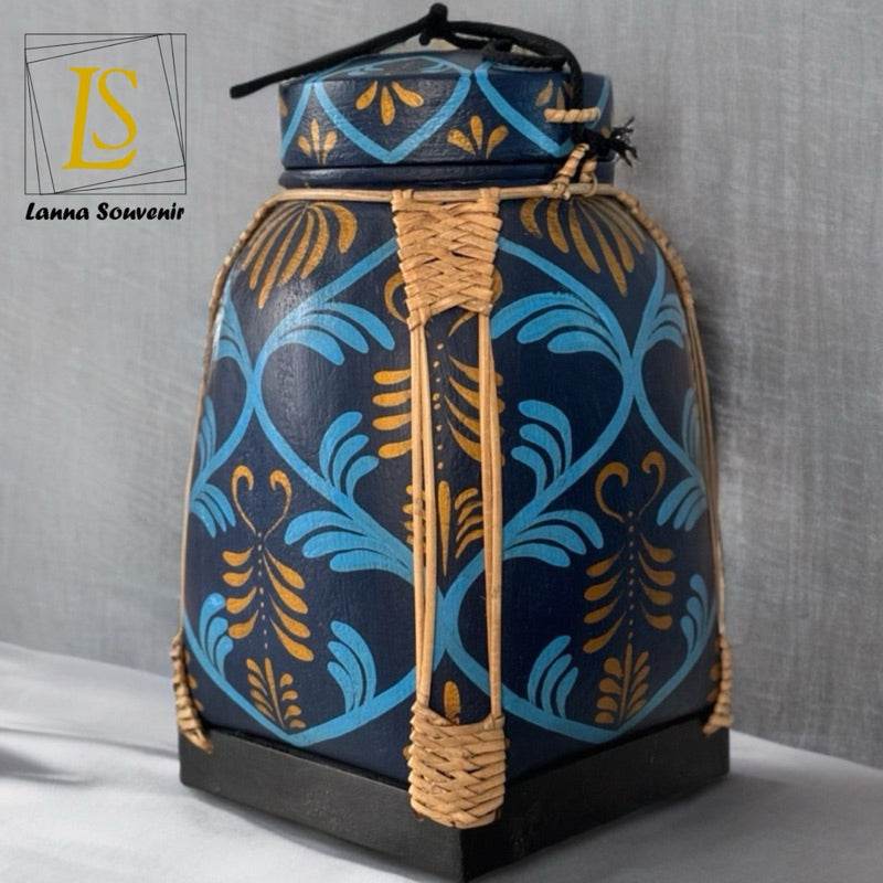 Lanna style bamboo storage box with blue and gold traditional patterns and woven details