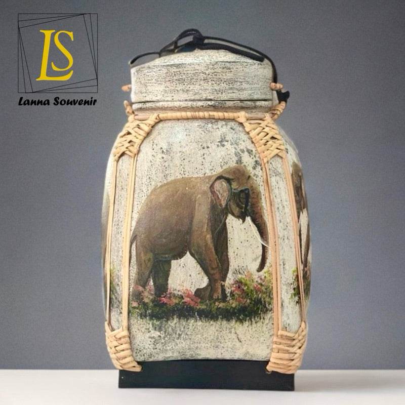 Lanna style bamboo storage box with elephant design and woven bamboo frame for home kitchen use