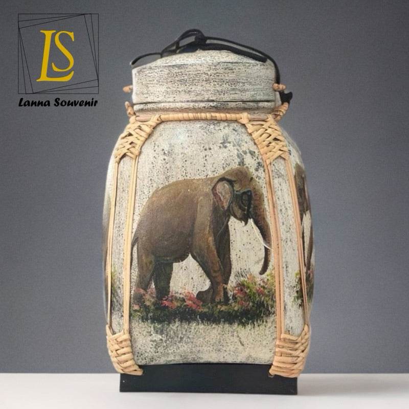 Lanna style bamboo storage box featuring an elephant design and woven bamboo frame