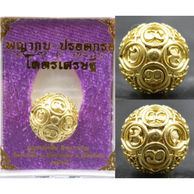 Thai Blessing Co gold engraved feng shui talisman sphere displayed in purple box ancient mercury spirit orb