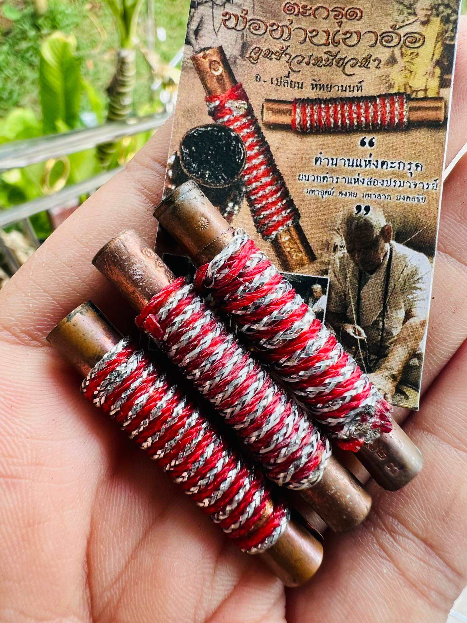 Thai Blessing Co black glutinous rice takrud amulet set of three copper scrolls wrapped in red and silver thread