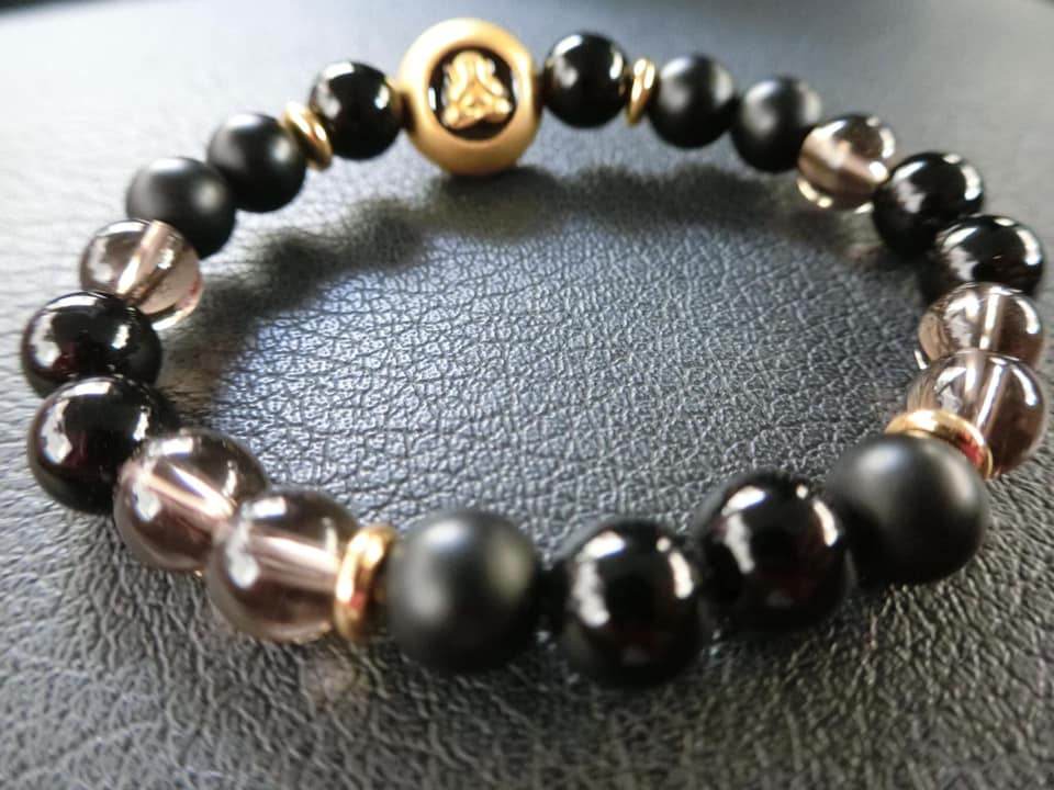 Thai amulet for protection and wealth bracelet made with black and smoky crystal beads