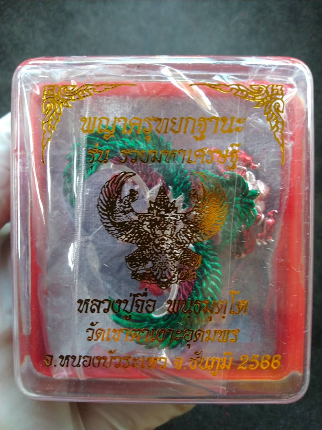 Thai Blessing Co multicolored Garuda pendant amulet in clear red display box Garuda Wealthy Millionaire Edition