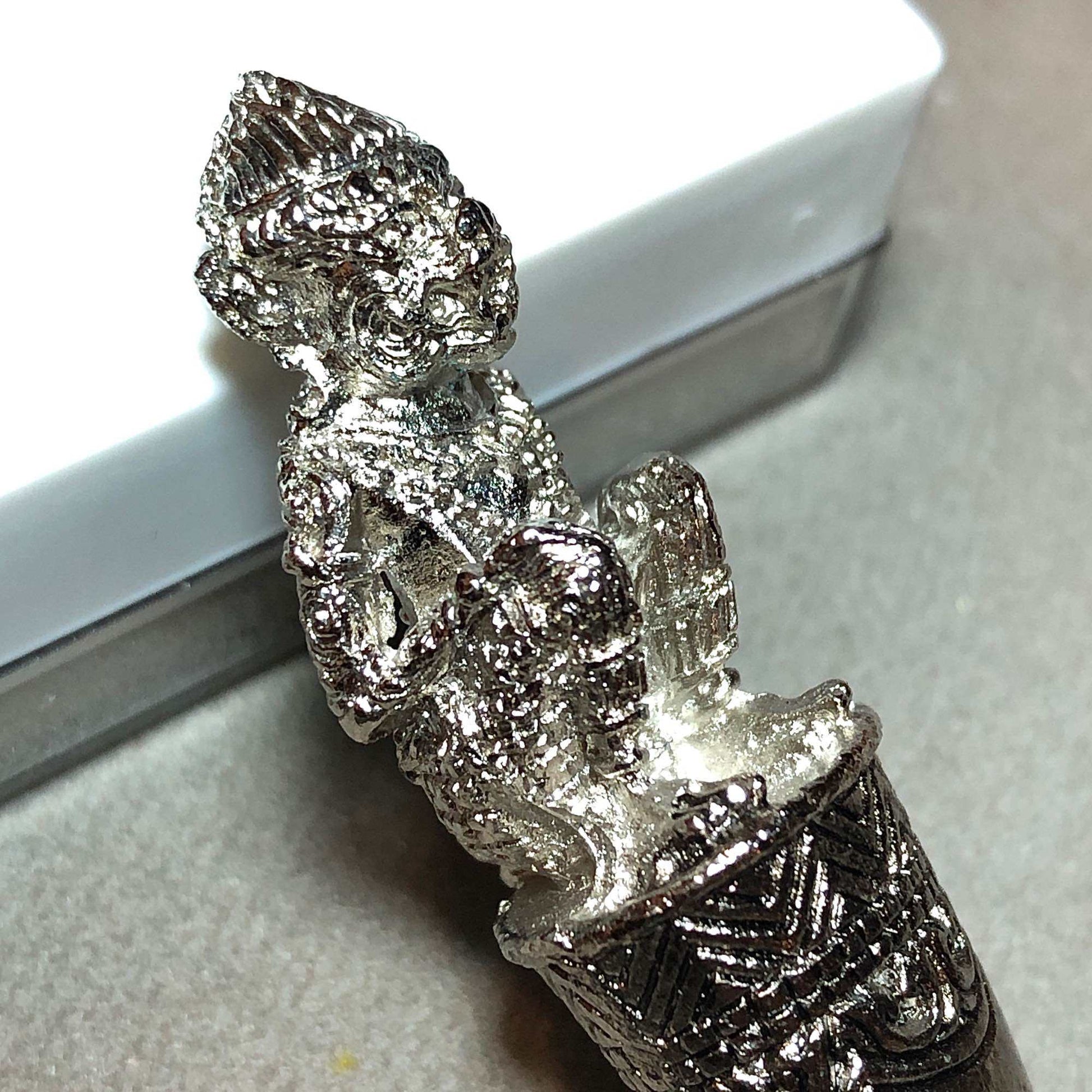 Thai Blessing Co silver amulet pendant featuring Hanuman Sitting on Fangs with ornate engravings
