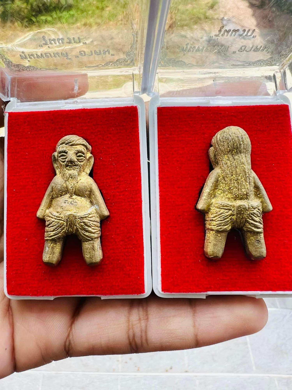 Hoon Payon ancient Thai guardian doll amulet front and back views gold tone in red display box