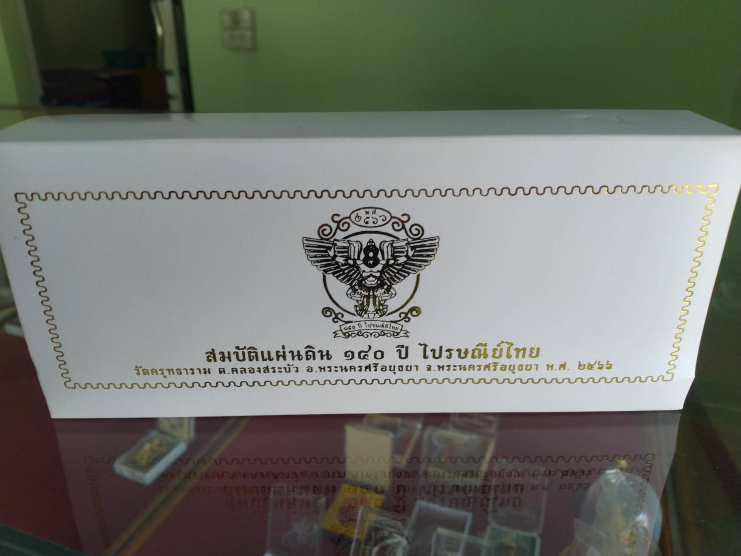 Thai Blessing Co limited edition Garuda amulet set in white box with gold Garuda emblem and Thai script