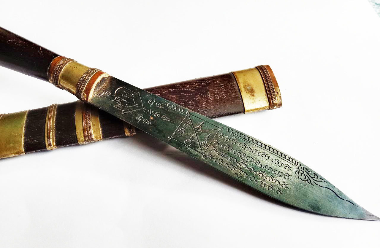 Luang Pu Moon ritual knife engraved ceremonial blade with brass fittings wooden handle and decorated sheath