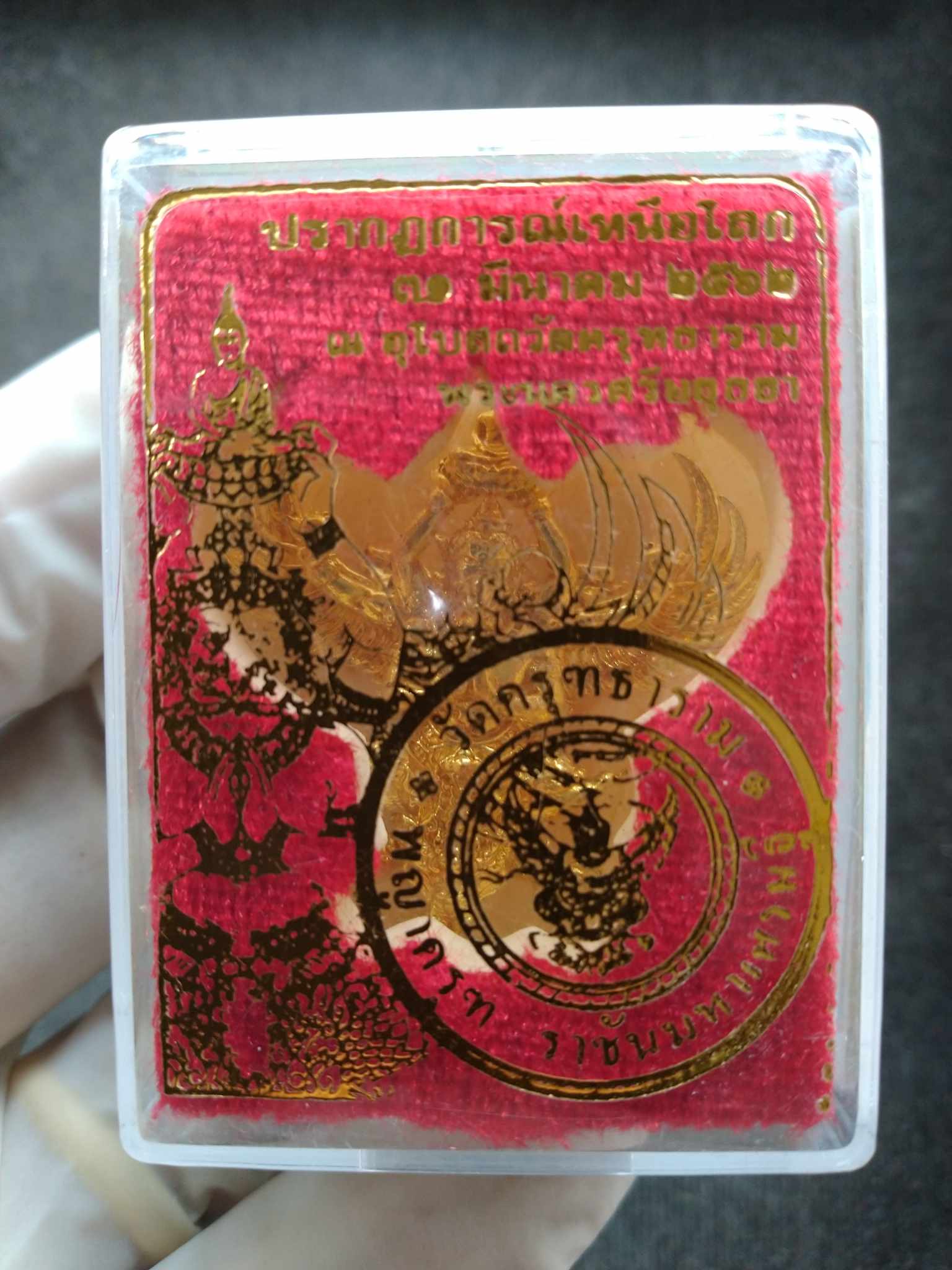 Phaya Garuda royal amulet in clear plastic case with red velvet and gold embossed seal by Thai Blessing Co