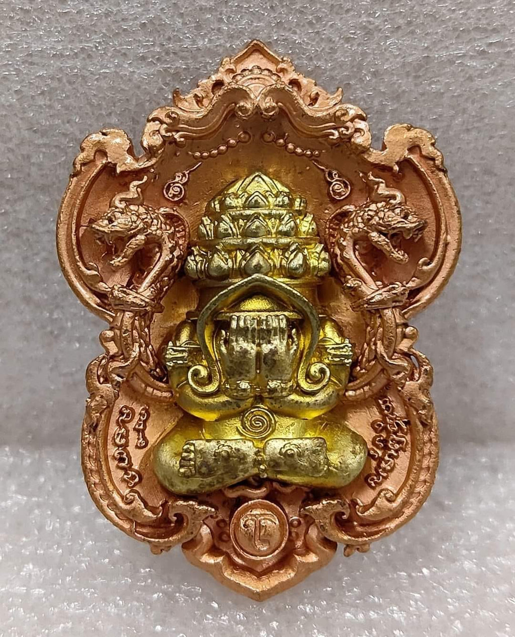 Thai Blessing Co Phra Pidta amulet for wealth gold and copper ornate pendant with naga serpents