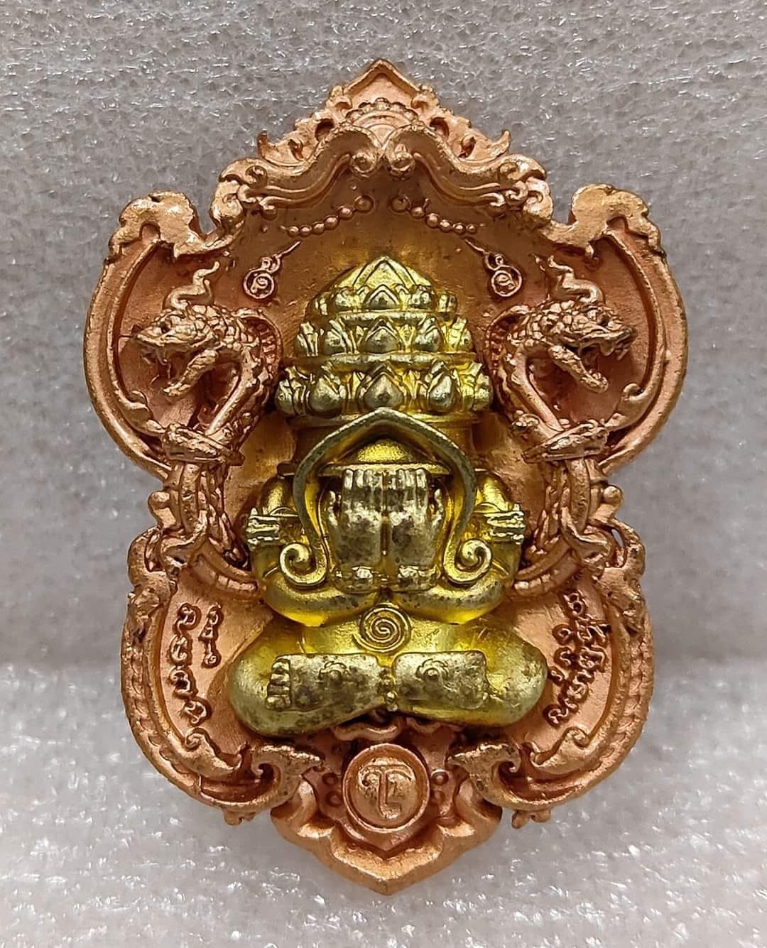 Thai Blessing Co Phra Pidta amulet for wealth gold and copper ornate pendant with naga serpents