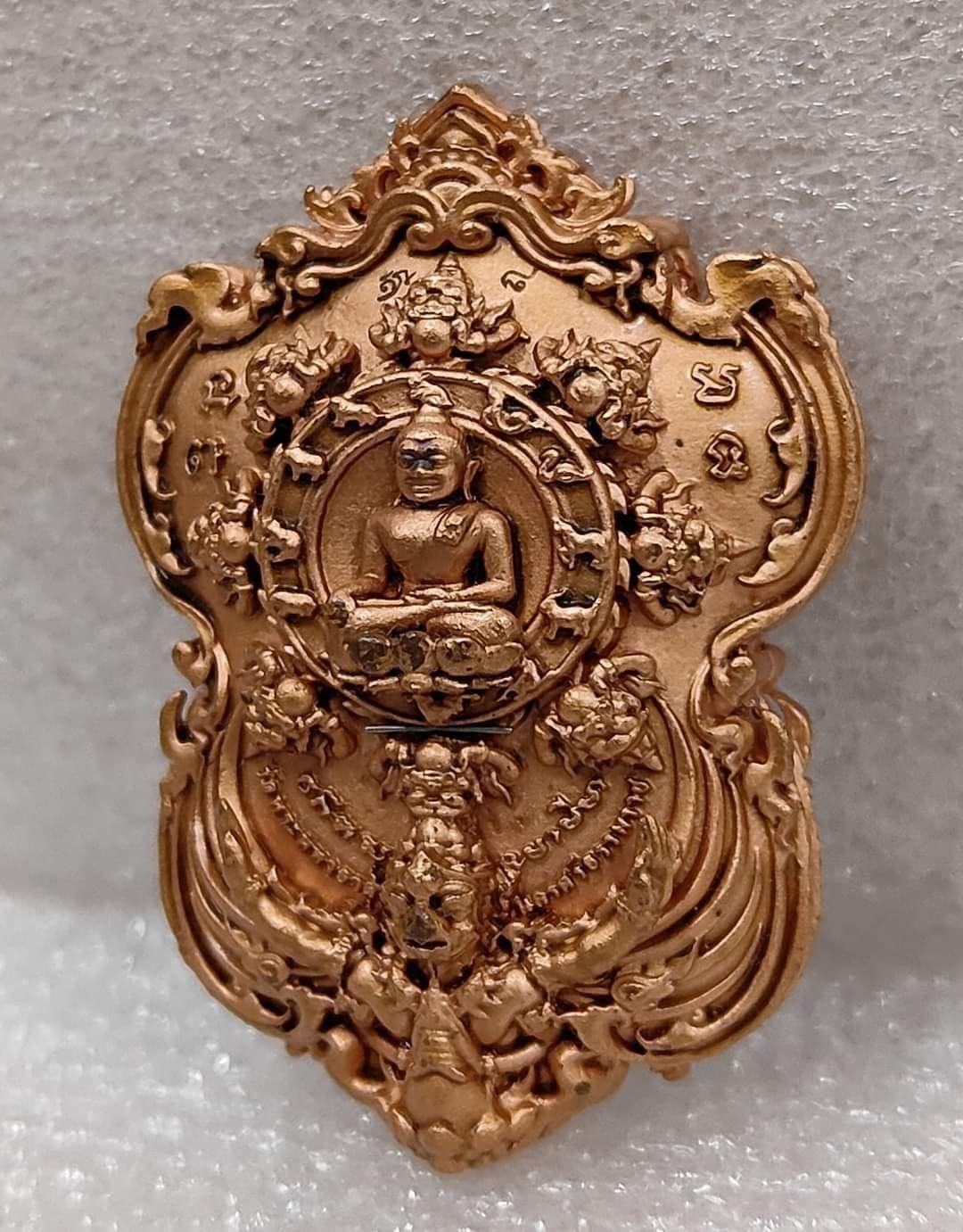 Thai Blessing Co ornate gold pendant Phra Pidta amulet for wealth with intricate floral motifs