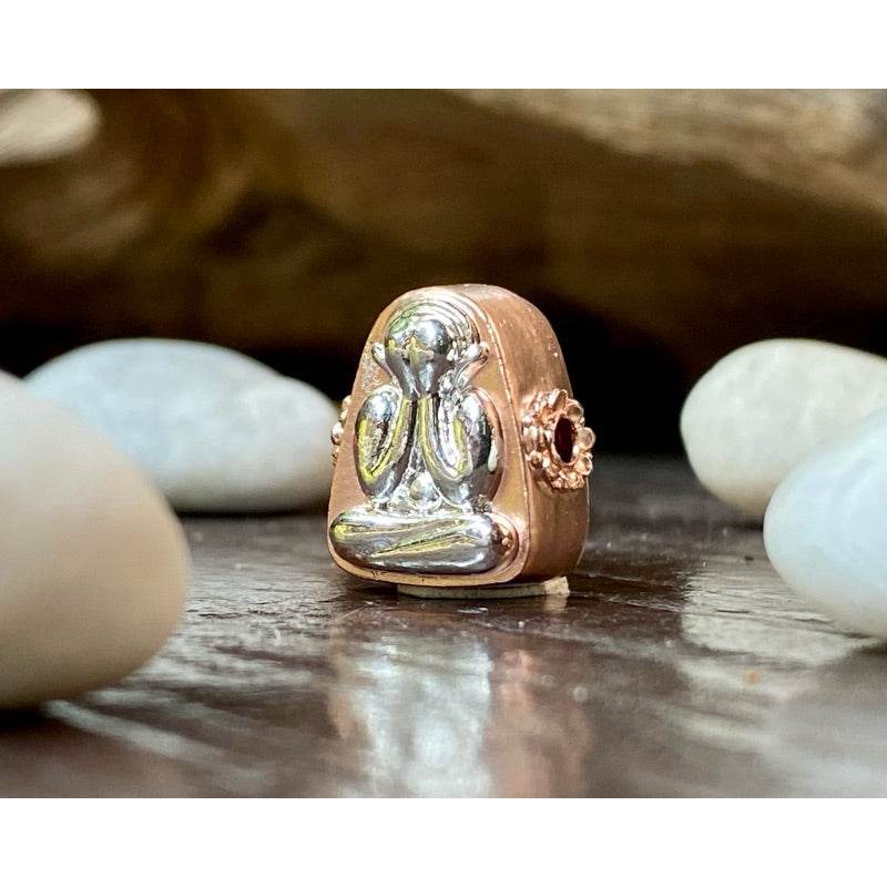 Phra Pidta Namo amulet two-tone small seated figure covering eyes in silver and copper finish polished detail