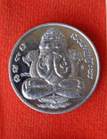 Phra Pidta Amulet - Brass Coin for Protection and Prosperity ตะกั่ว