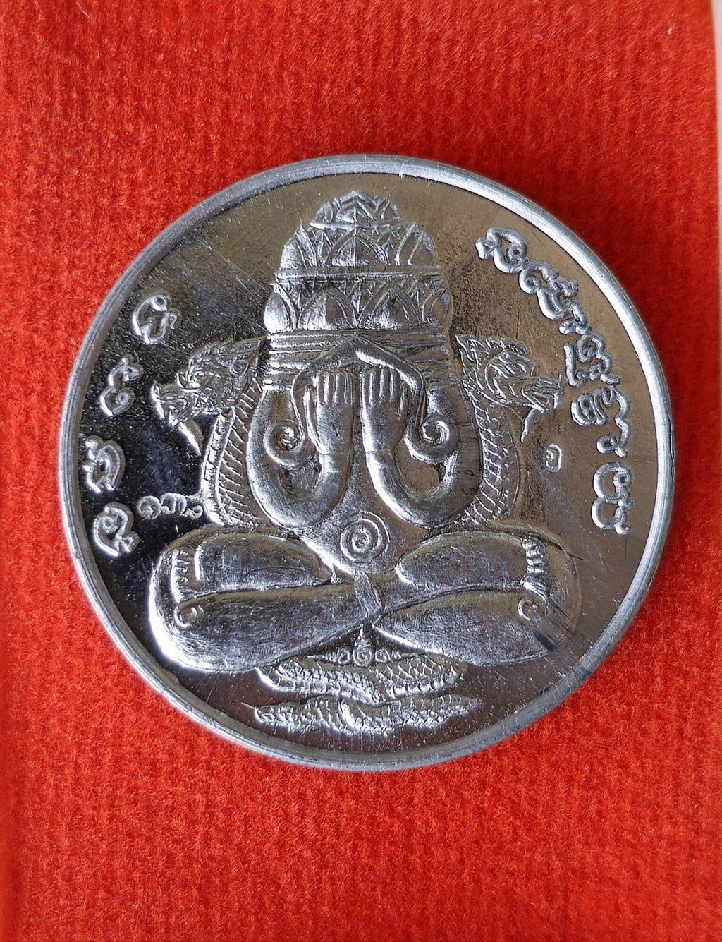 Phra Pidta Amulet - Brass Coin for Protection and Prosperity
