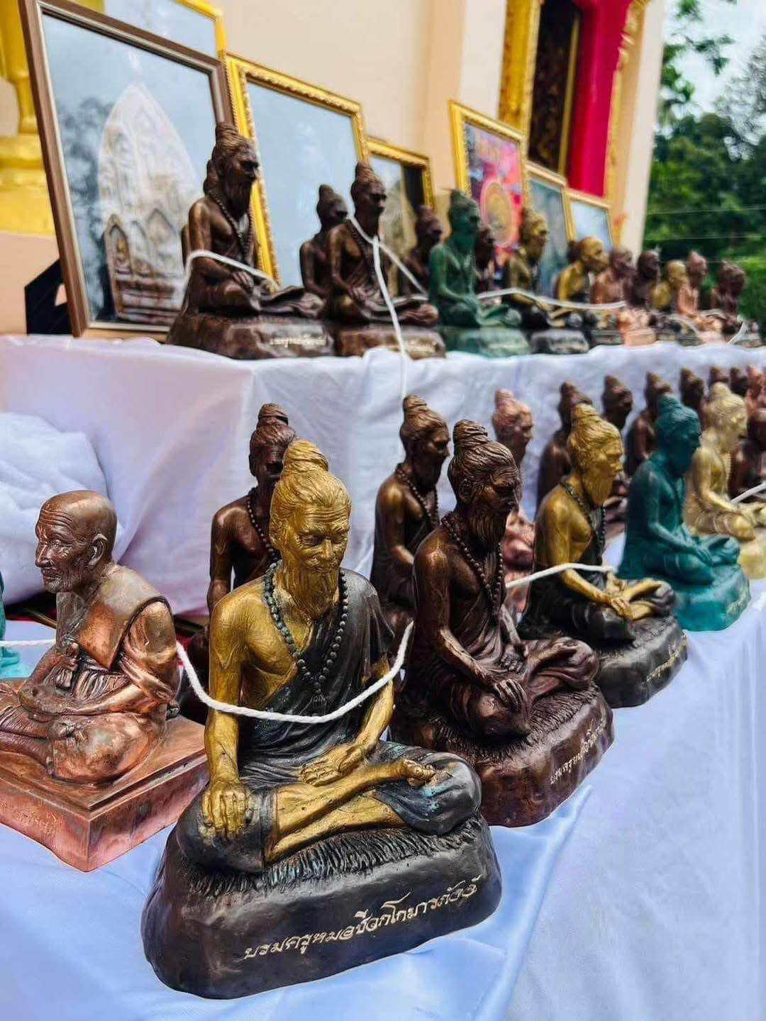 Phu Lersi Jivaka Komarabhacca statue assortment of seated hermit amulet statues in bronze and gold for altar decor