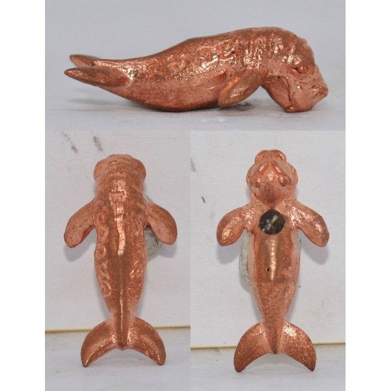 Handcrafted copper Pla Du Yong (Manatee) Amulet . Three view photos showing side top and front of small sacred talisman