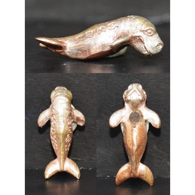 Pla Du Yong (Manatee) Amulet small bronze manatee charm shown in side and top bottom views for protection