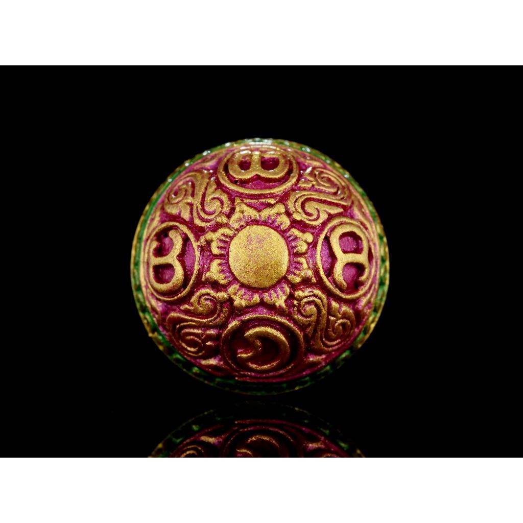 Ornate round Rahu Amulet . hand painted gold and magenta talisman with lotus motifs on black