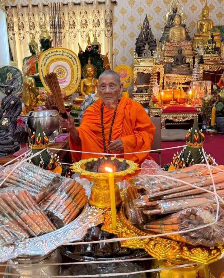 Thai Blessing Co monk blessing amulets and Rahu Garuda mercury talisman ball on shrine
