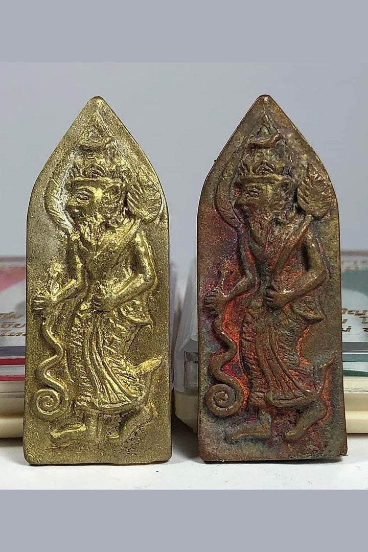 Two Ruesi Bai Pai amulet for protection plaques in gold and aged bronze Thai hermit deity figures