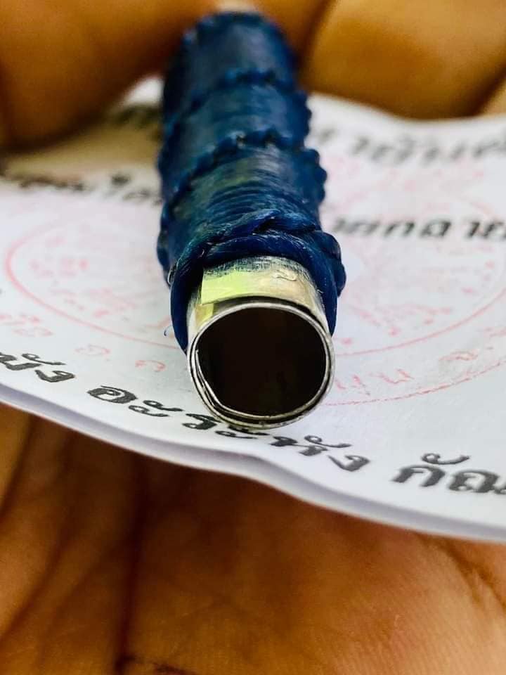 Thai Blessing Co takrud to reflect negative energy amulet tube wrapped in blue thread on sacred paper