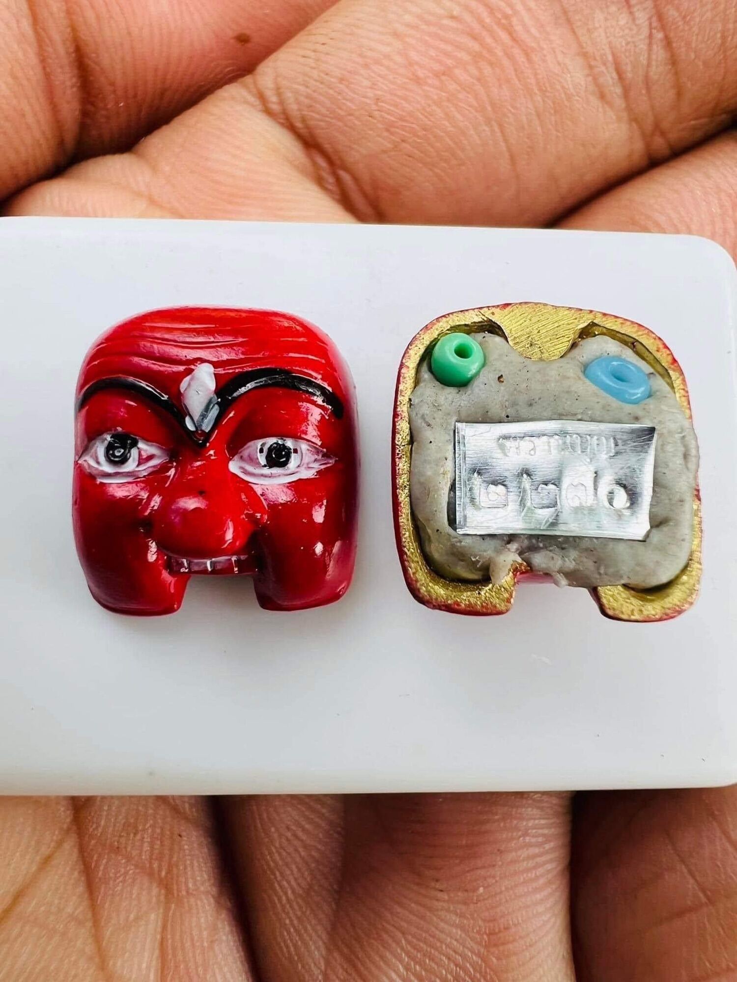 Thai prosperity charm for wealth red elephant amulet pendant front painted face and detailed back with metal plate
