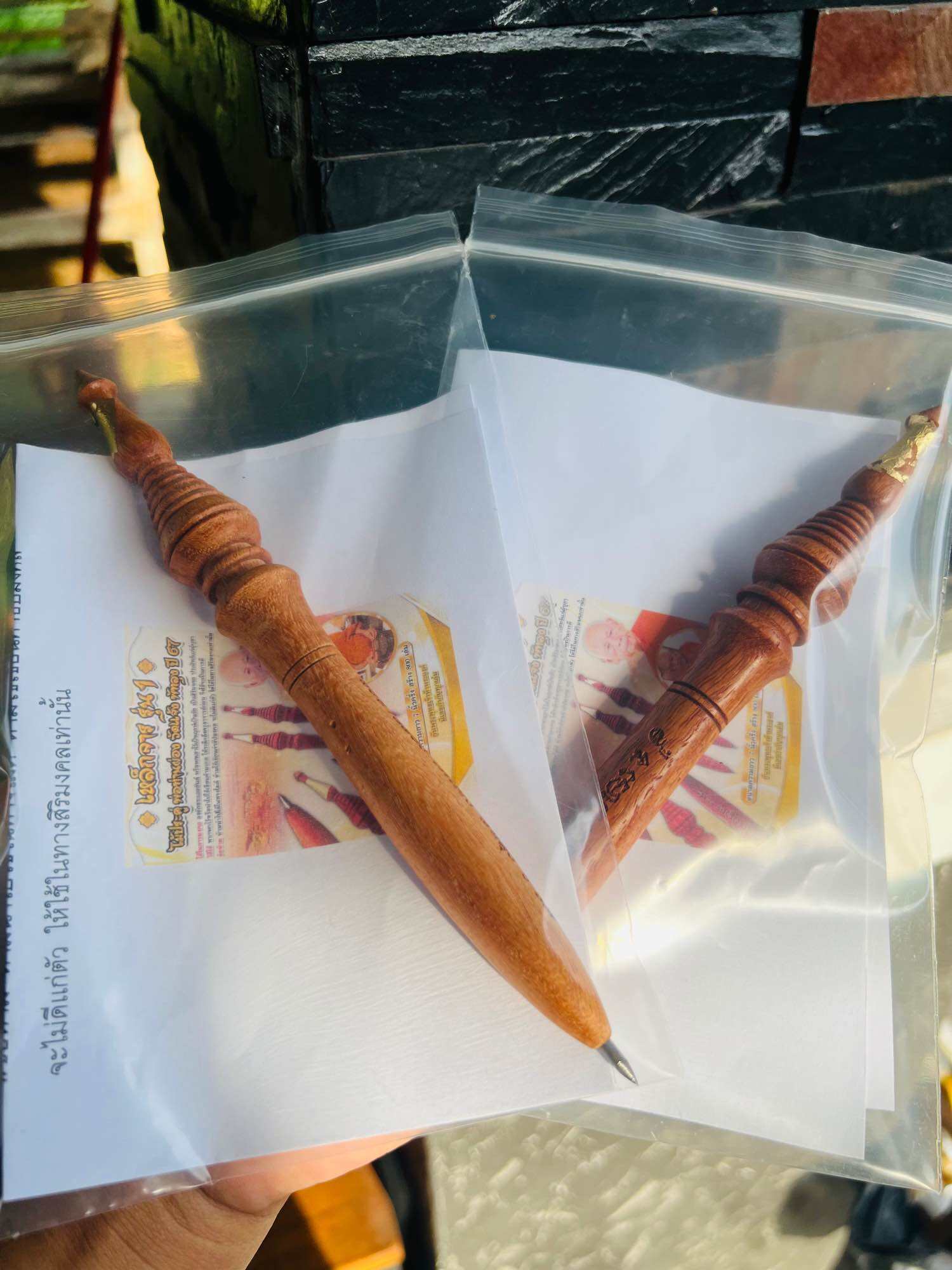 Thai spiritual master stick wooden blessing pen with carved handle in clear pouch by Thai Blessing Co