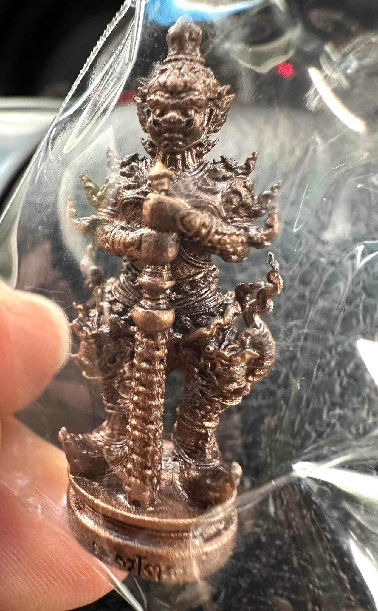 Thao Wessuwan Coin Amulet from Wat San Mameo for Wealth and Protection