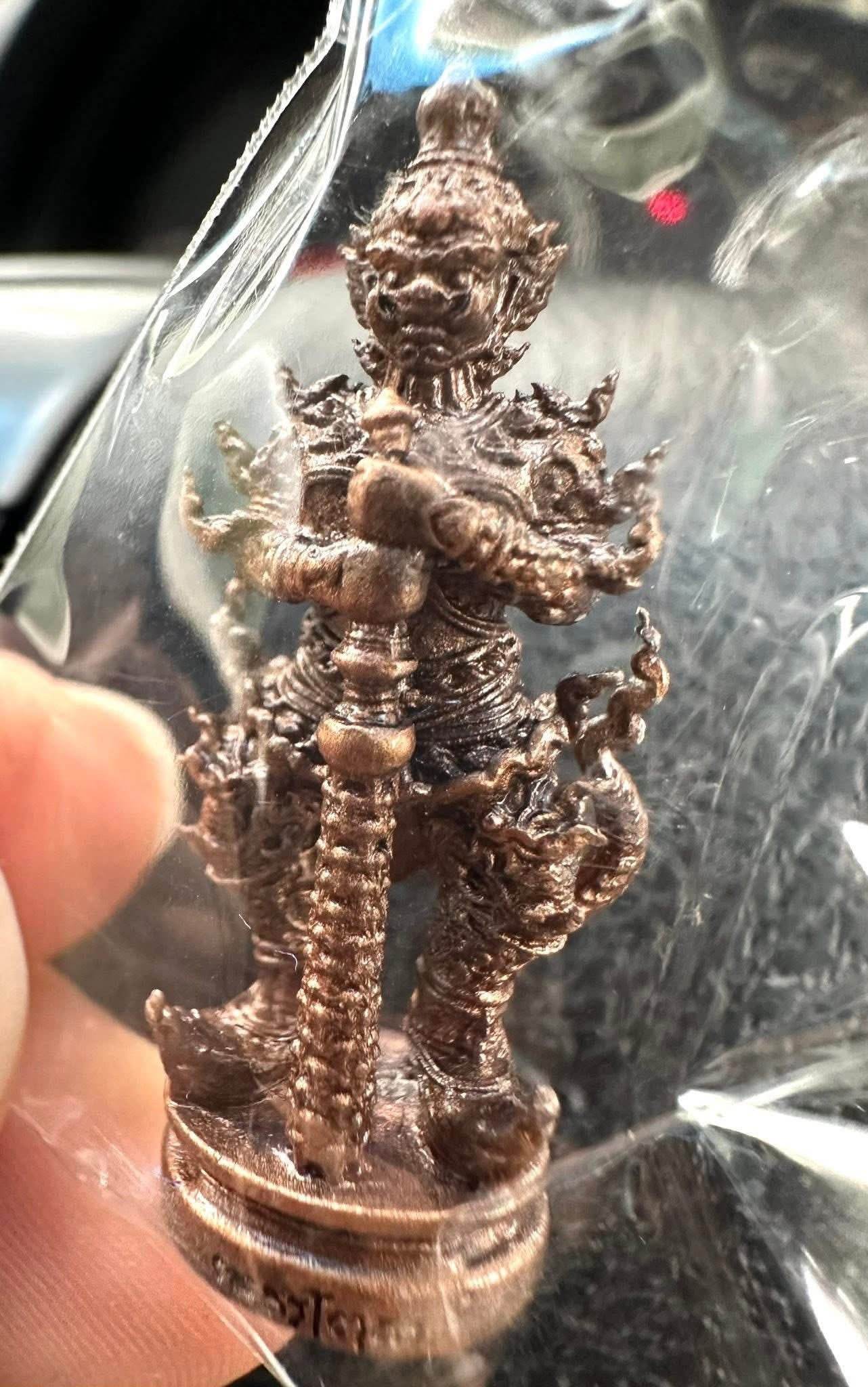 Thao Wessuwan Coin Amulet from Wat San Mameo for Wealth and Protection