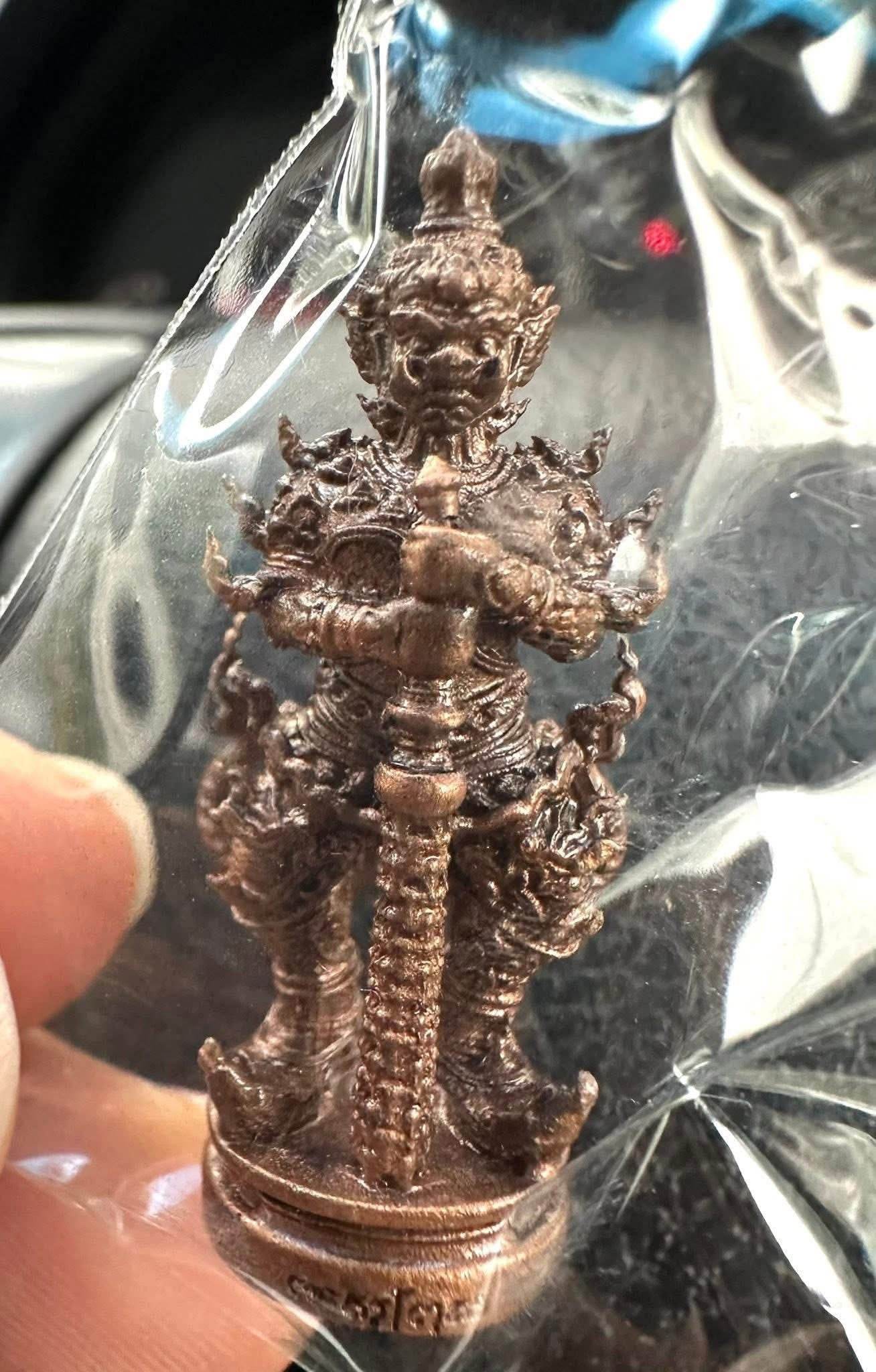 Thao Wessuwan Coin Amulet from Wat San Mameo for Wealth and Protection