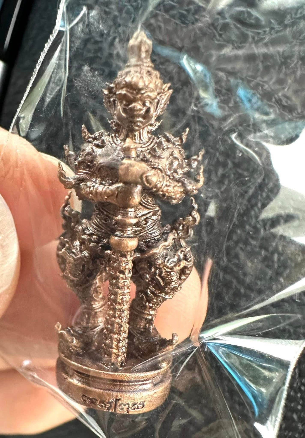 Thao Wessuwan Coin Amulet from Wat San Mameo for Wealth and Protection