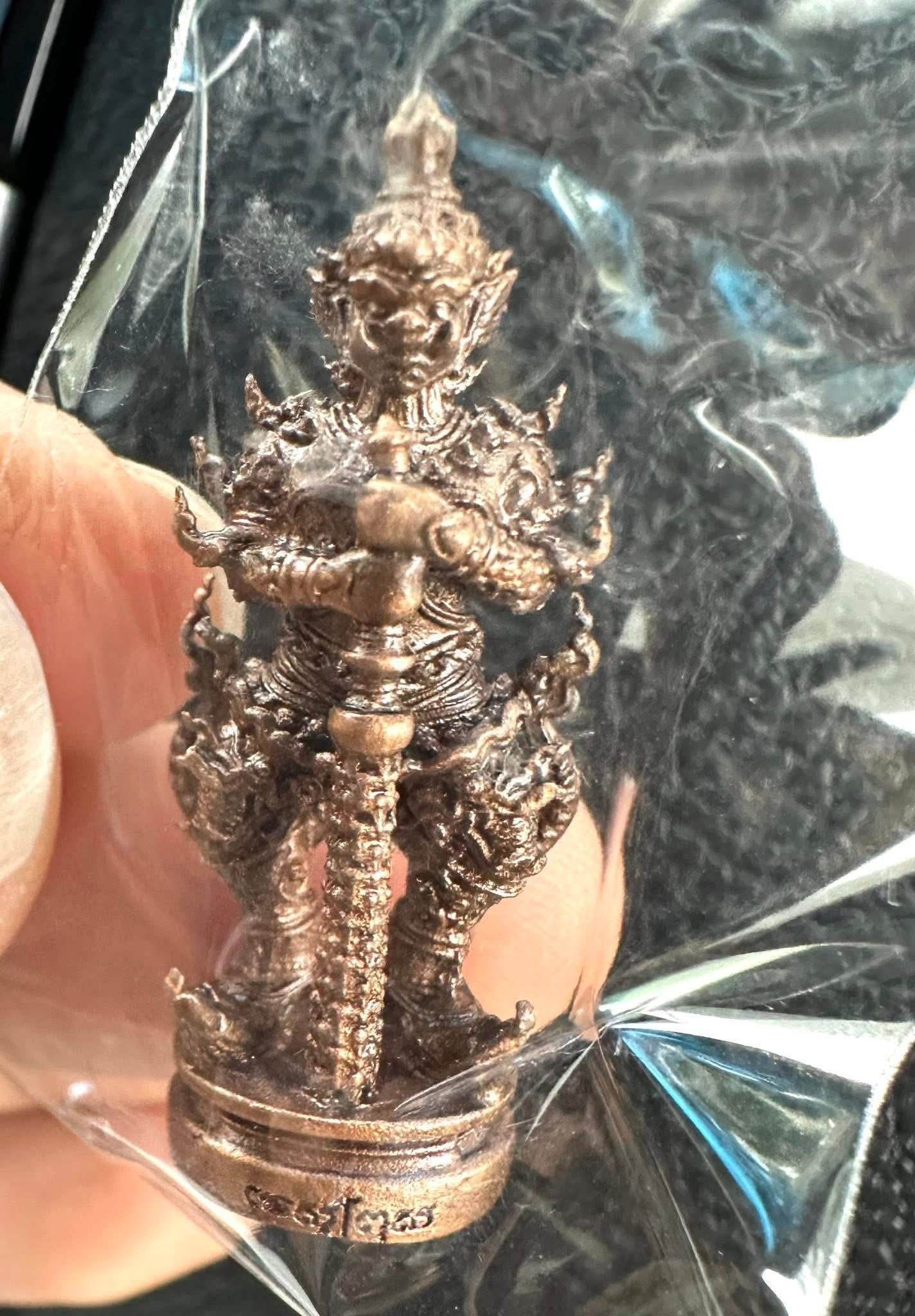 Thao Wessuwan Coin Amulet from Wat San Mameo for Wealth and Protection