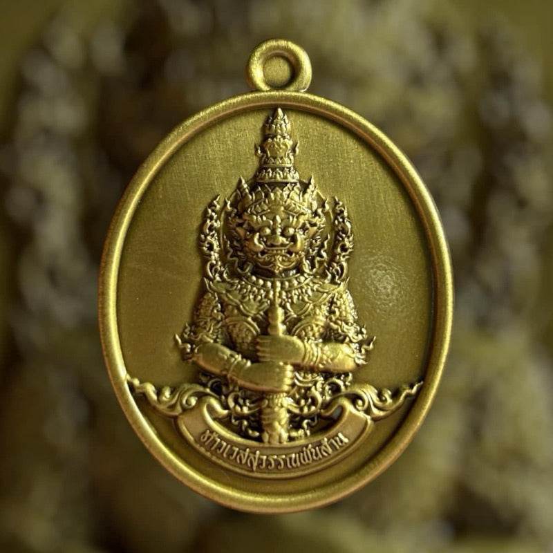 Thao Wessuwan medallion set gold oval pendant embossed guardian deity holding staff ornate Thai home protection talisman