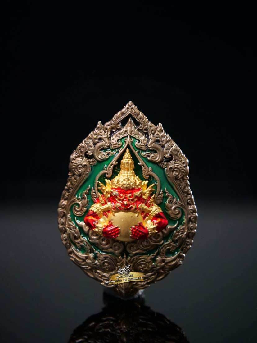 Narayana on Garuda Medallion ornate Thai amulet with green enamel and red gold detailing in engraved silver frame