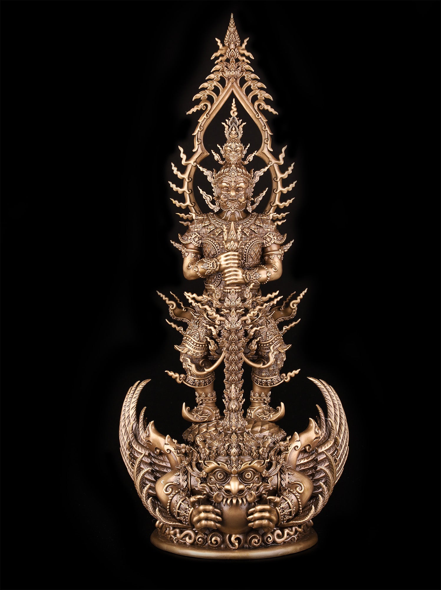 Thai Blessing Co Thao Wessuwan statue for wealth and protection. Ornate gold guardian pendant with intricate Thai motifs
