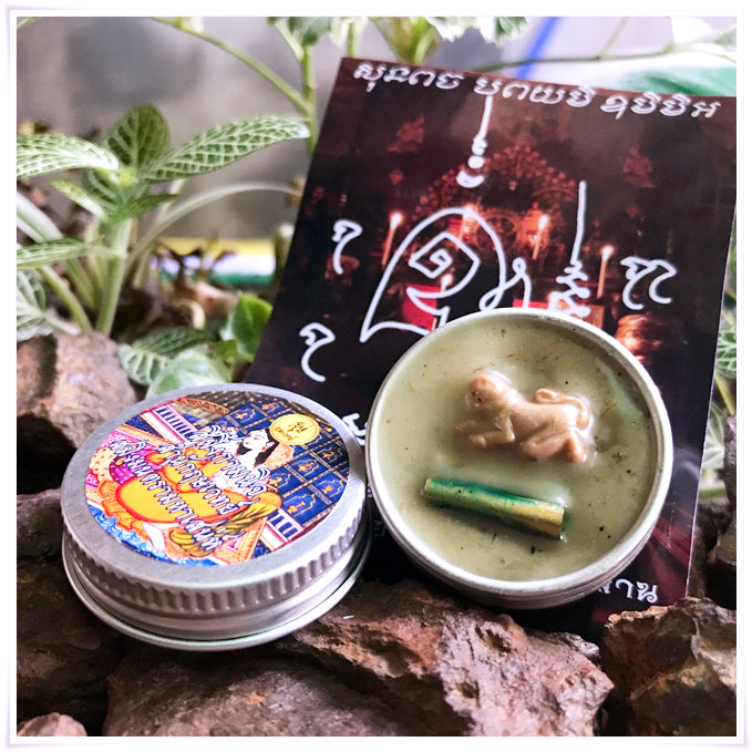 Thai attraction charm balm in tin with a small figure and herbal ingredients for love and attraction
