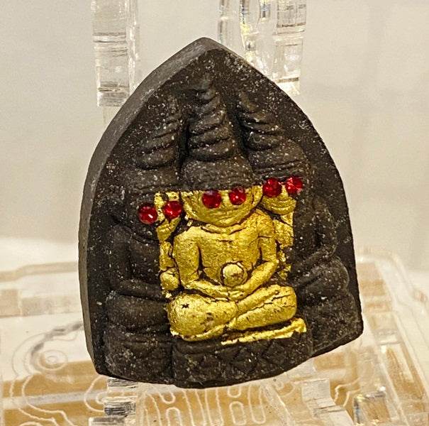 Thai blessed love and money talisman featuring intricate designs and red embellishments