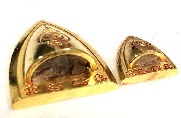 Thai blessed talisman good luck in gold plating, featuring intricate designs and authentic gemstones