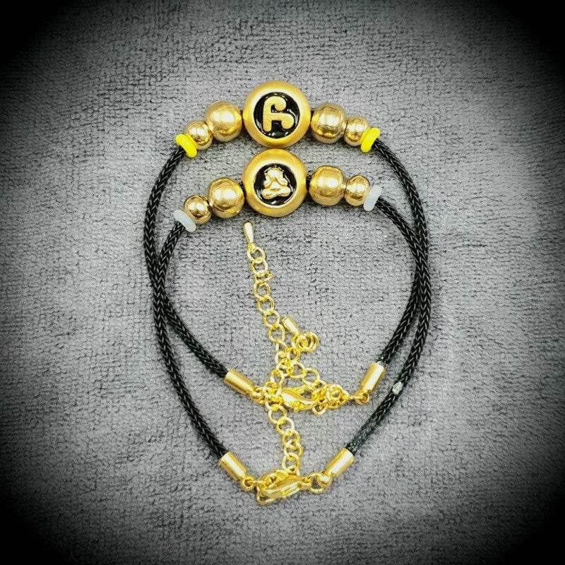 Namo Maha Mongkol Bracelet with Phra Pidta Amulet black braided cord bracelet set with gold beads and adjustable chain