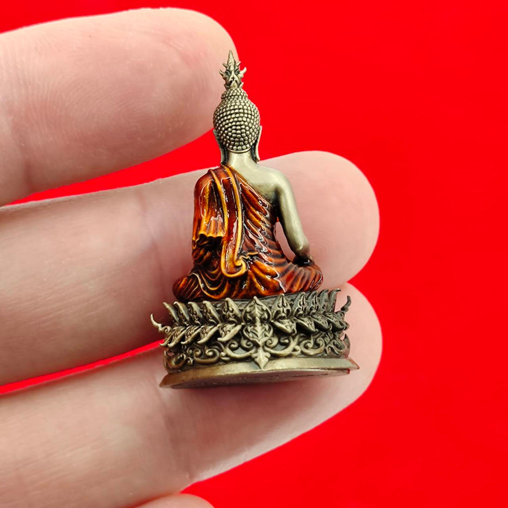 Thai Buddha amulet blessed by Luang Por Weera, intricately detailed with traditional colors and design
