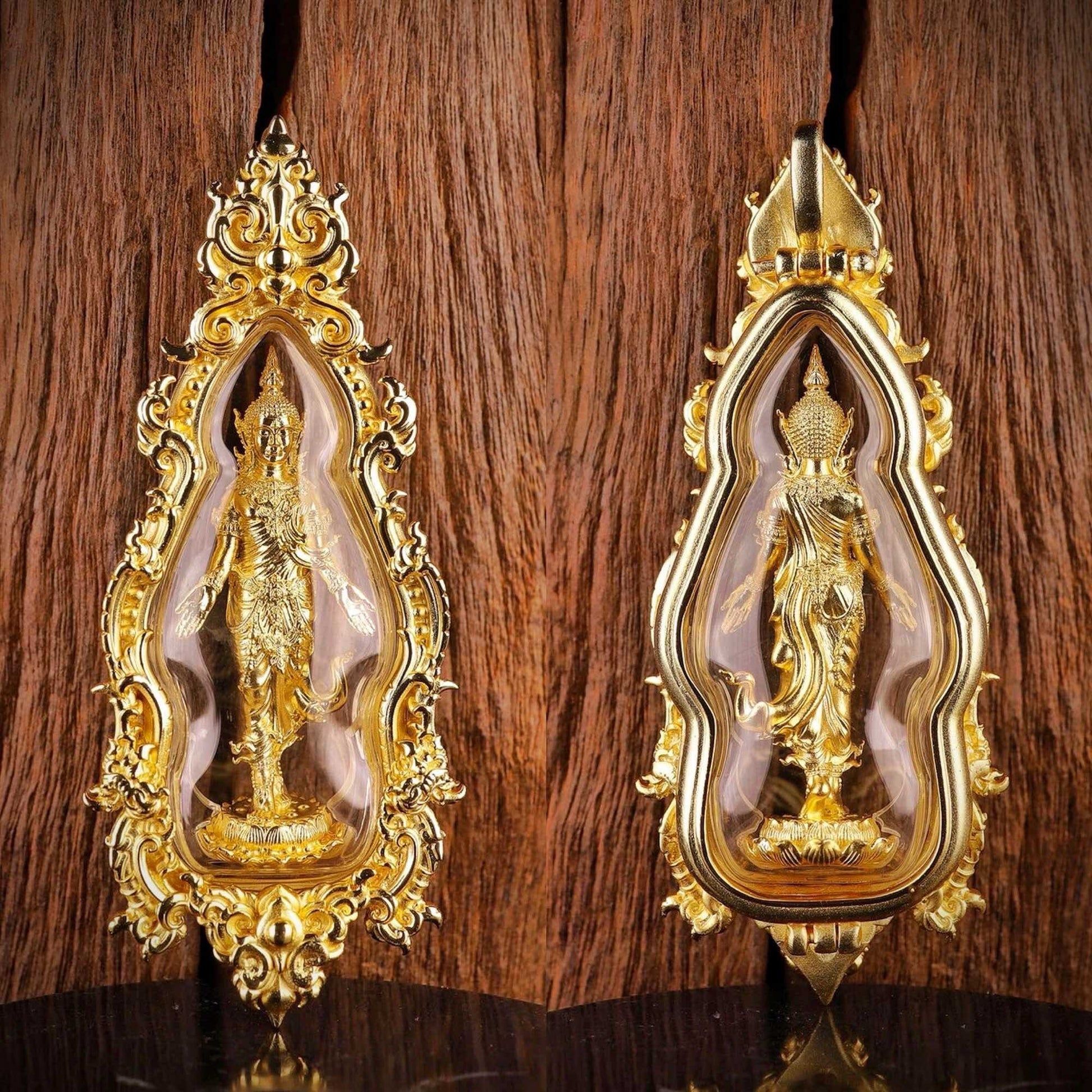 Elegant Thai Buddhist lucky charm pendant featuring intricate gold detailing and a serene figure inside