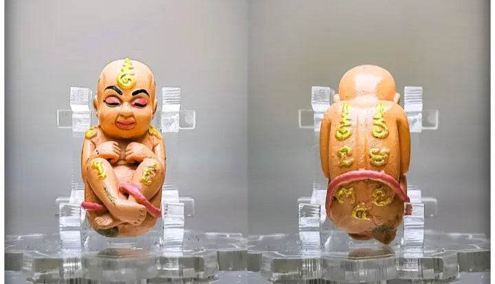 Thai child spirit for good luck figure depicting a smiling child with vibrant details and traditional designs