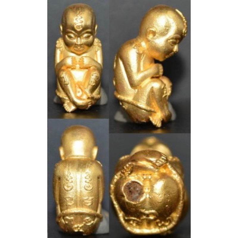 Thai child spirit for good luck figurine in gold with detailed carvings, perfect for home decor