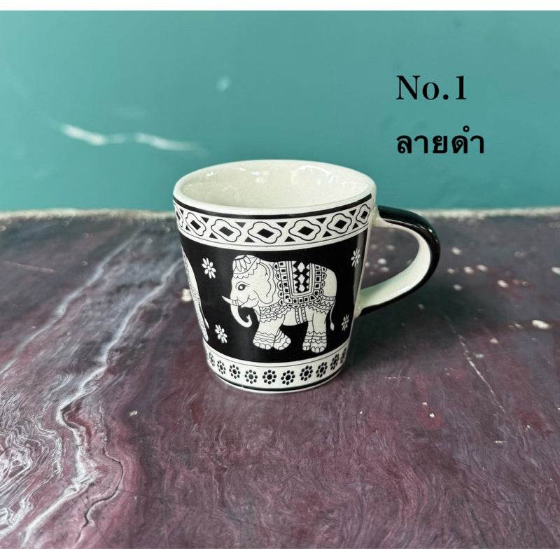 Thai elephant ceramic shot glass in black and white with intricate elephant design from One-Sake.com